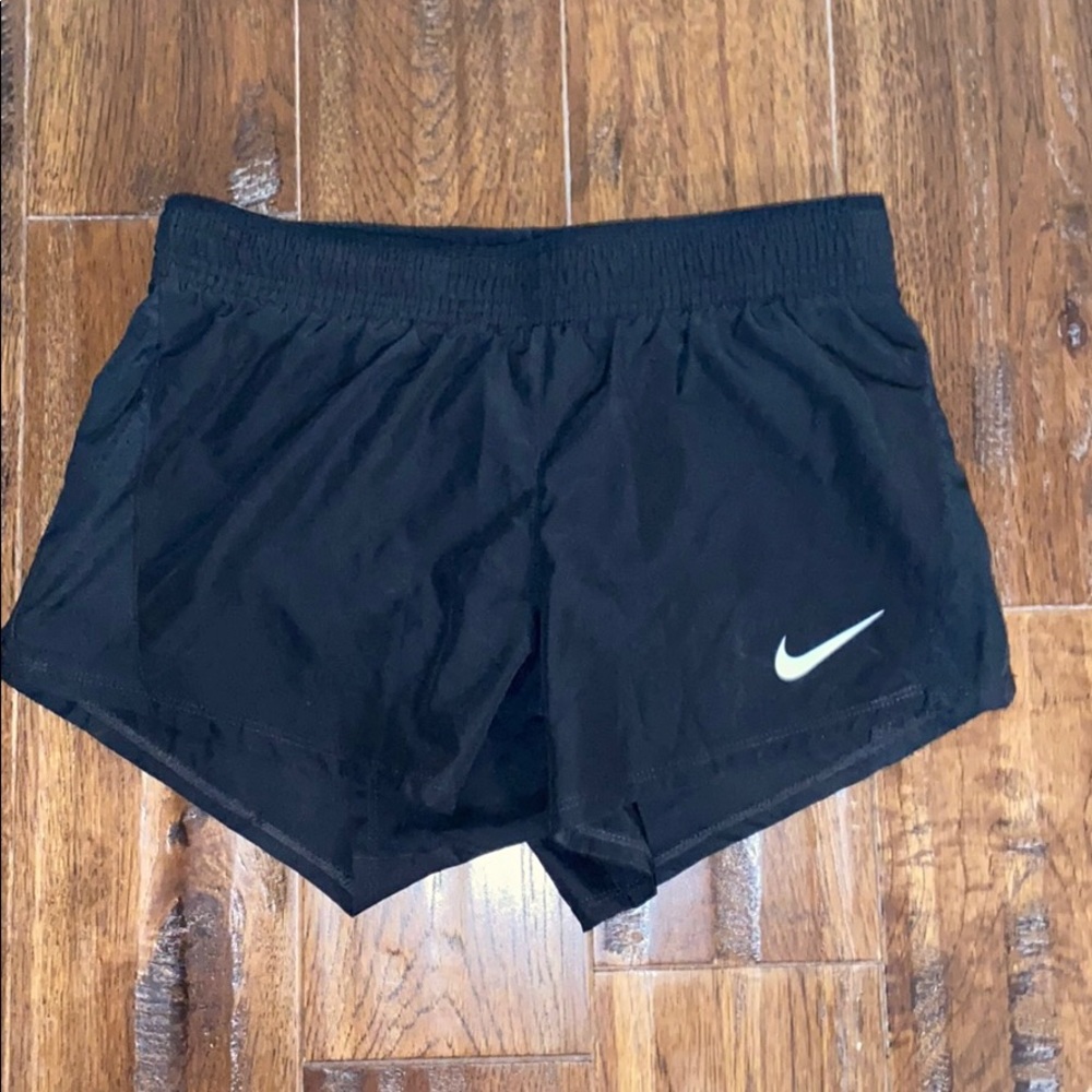 Black Nike running shorts
